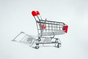 Shopping cart, isolated on white background photo