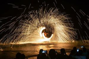 Amazing fire show on The beach at Sai Kaew Beach, Mu Koh Samed  ,Rayong ,Thailand photo