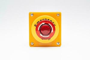 Stop Button and the Hand of Worker About to Press it. emergency stop button. Big Red emergency button or stop button for manual pressing. photo