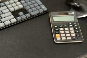 Office leather desk table with calculator. calculator.Copy space for text.Empty Blank to word.Business Finance,Education Technology. photo