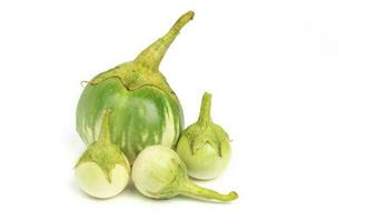 Fresh aubergine on white background photo