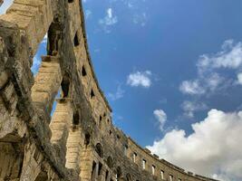 Walls of Amphitheater in Pula, City in Croatia photo