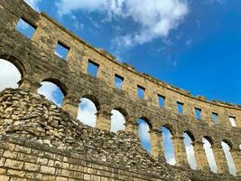 Walls of Amphitheater in Pula, City in Croatia photo