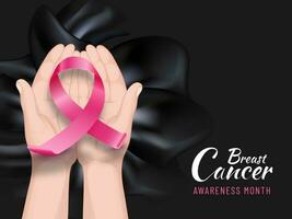 Breast Cancer Awareness Month banner or poster design with human hands holding pink ribbon on black silk fabric background. vector