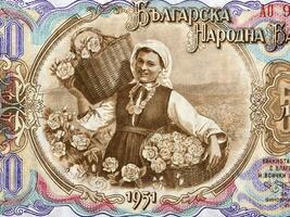 Peasant woman with baskets of roses photo
