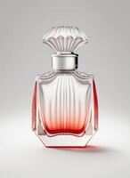 A high class bottle of glass perfume with light red liquid. Aromatic perfume bottles on white background. Beauty product, cosmetic, perfume day, fragrance day or perfume launch event by photo