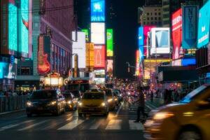 New York City, USA - August 9, 2019-People and tourists stroll among the lights and skyscrapers of Time Square in Manhattan during a summer night photo