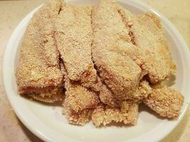 breaded wiener schnitzel with side dishes photo