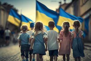 Marching for Liberty Children Carrying Ukrainian Flags Through the Streets as a Symbol of Freedom photo