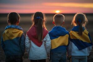 Futures of Freedom Children with Ukrainian Flags Gazing at Sunset, a Hopeful Symbol of a Brighter Tomorrow photo