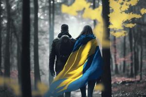 Freedom in the Woods Ukrainian Couple with Flag Walking Hand in Hand photo