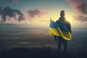 Ukrainian Flagbearer Stands Proud on Mountain Top, Gazing at the Horizon - A Symbol of Freedom photo