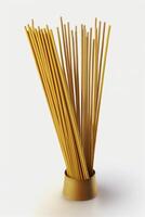 Isolated Chinese Incense Sticks on White Background with Copy Space photo