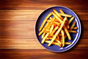 French fries with ketchup on a wooden table. Selective focus. photo