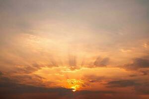 Beautiful, luxury soft gradient orange gold clouds and sunlight between the blue sky perfect for the background, take in everning,Twilight photo