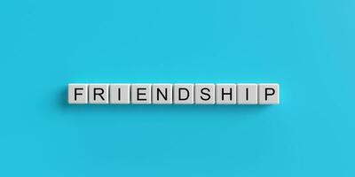 Cube block wooden oak square friendship text font calligraphy blue color background together happy friend partnership love group enjoy teamwork lifestyle woman man support family community.3d render photo