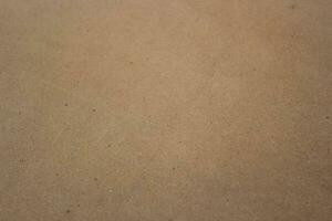 Brown paper texture close detailed background, shiny brown paper surface photo