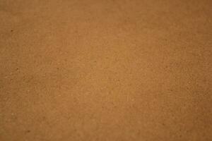 Brown paper texture close detailed background, shiny brown paper surface photo