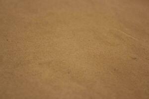 Brown paper texture close detailed background, shiny brown paper surface photo
