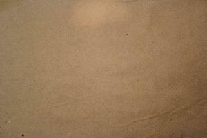 Brown paper texture close detailed background, shiny brown paper surface photo