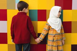 Young Muslim Boy and Girl Holding Hands on Multicolor Grid Pattern Background. Illustration. photo