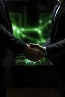 Crop Image of Two Business Person Shaking Hands in Green Laser Light Networking Loopable Background. photo