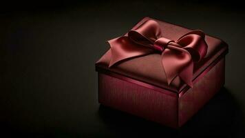 3D Render of Glossy Matte Red Gift Box With Silk Bow Ribbon On Black Background And Copy Space. photo