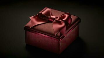 3D Render of Glossy Matte Red Gift Box With Silk Bow Ribbon On Black Background And Copy Space. photo