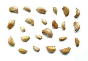 Fresh garlic isolated on a white background. Spices, kitchen ingredients, cooking spices, healthcare, ingredients. photo