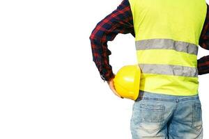 Construction worker holding yellow helmet. Building worker wearing fluorescent waistcoat. Isolated. photo