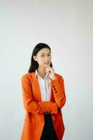 Portrait photo of young beautiful Asian woman feeling happy and holding smart phone, tablet and laptop with black empty screen on white background product presenting concept.