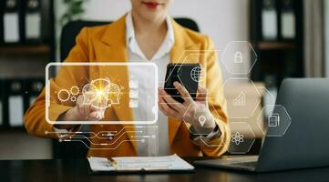 Woman using chat bot in smartphone intelligence Ai. Chat with AI Artificial Intelligence, developed by OpenAI generate. robot in online system. in modern office photo