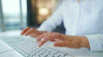 Female hands typing on a computer keyboard. Concept of remote work video