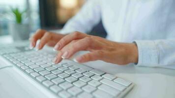 Female hands typing on a computer keyboard. Concept of remote work video