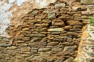 Ancient medieval stone wall texture background. photo