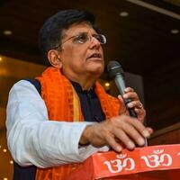 New Delhi, India - April 27 2022 - Piyush Goyal Cabinet Minister and core member of Bharatiya Janata Party - BJP during a rally in support of BJP candidate ahead of MCD local body Elections 2022 photo