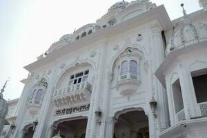 View of details of architecture inside Golden Temple - Harmandir Sahib in Amritsar, Punjab, India, Famous indian sikh landmark, Golden Temple, the main sanctuary of Sikhs in Amritsar, India photo