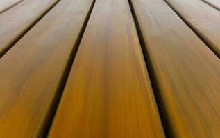 wood battens fence close up perspective view. abstract texture background no people. photo