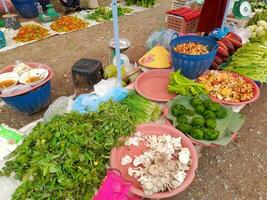 Local market in Laos. fresh vegetables and fruits market. photo
