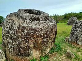 The Plain of Jars or Thong Hai Hin in Phonsavanh, Xiengkhoung. The Unesco world heritage site in northern of Laos. photo