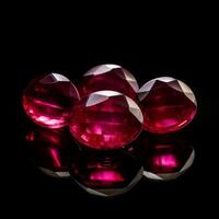 the tabletop five Burmese rubies on black background photo