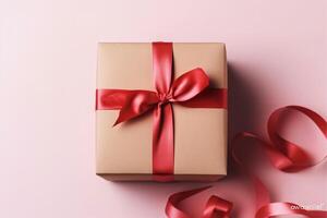 Pink gift box tide with red ribbons on pink background, mother's day or father's day or holly day photo