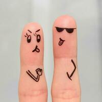 Finger art of couple. Couple of swears, shows the languages to each other. photo
