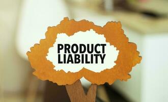 figure of a tree with text product liability inside the foliage. Business concept photo