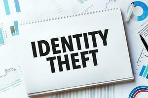 Notebook with Tools and Notes with text IDENTITY THEFT photo