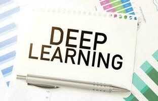 DEEP LEARNING on paper sheet and charts photo