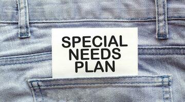 Text special needs plan on a white paper stuck out from jeans pocket. Business concept photo