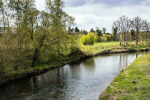 view of Istra river on cloudy spring day photo