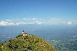 Aerial view from peak of domestic mountain Central Java Semarang. The photo is suitable to use for adventure content media, nature poster and forest background.