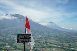 Aerial view from peak of domestic mountain Central Java Semarang. The photo is suitable to use for adventure content media, nature poster and forest background.